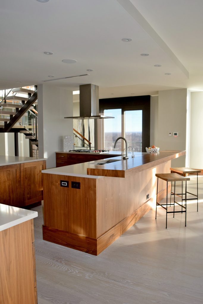 contemporary kitchen with elevated island bar