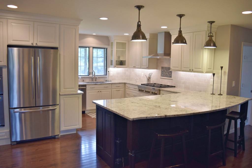 Traditional kitchen style with white raised panel cabinets